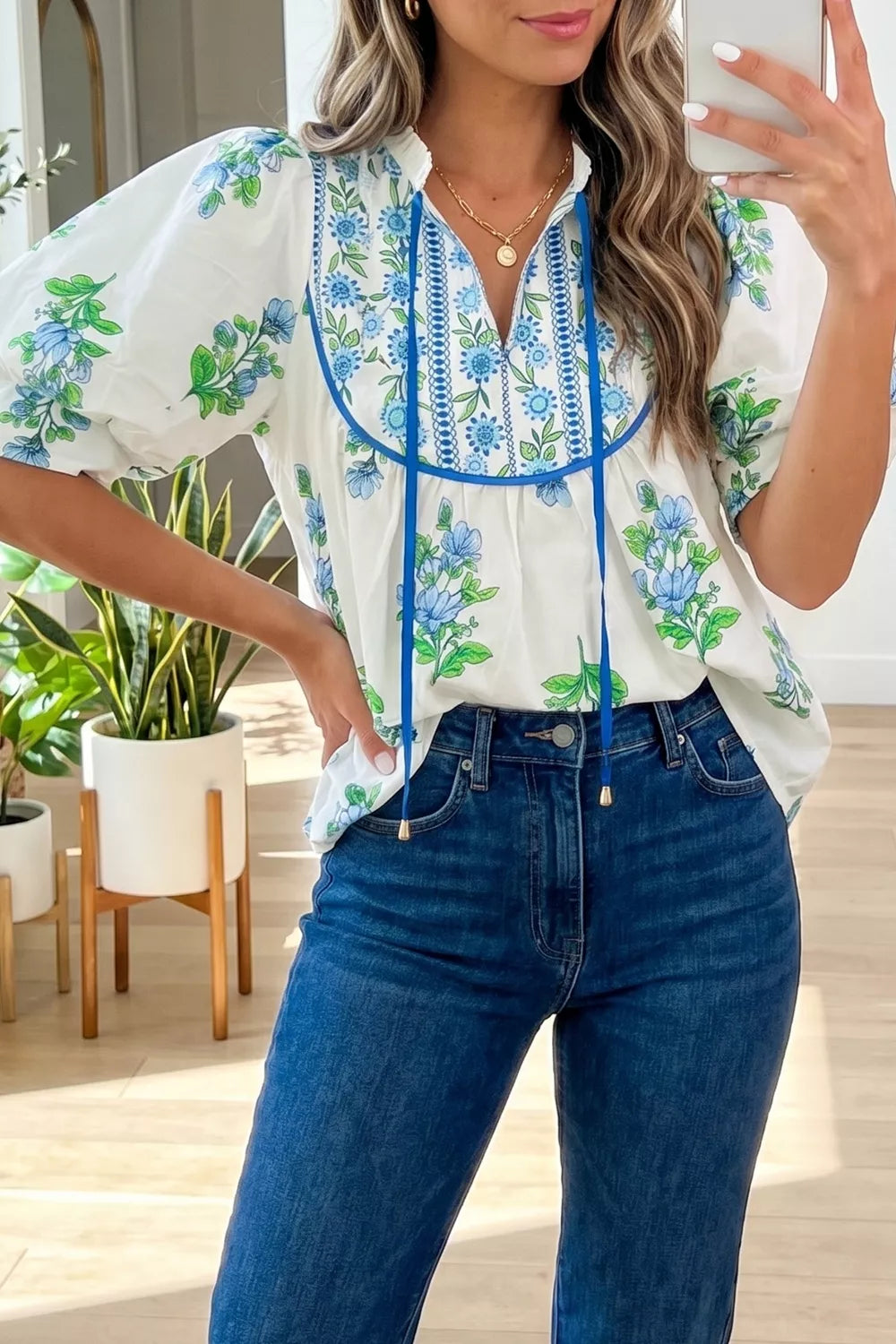 HT Marlowe Woman wearing a floral blouse